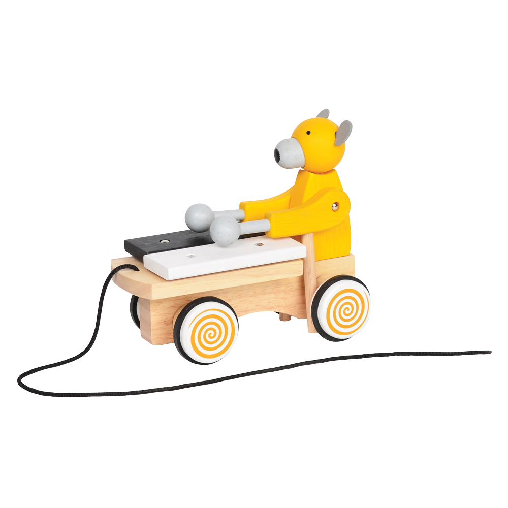 A colorful toy xylophone in the shape of a cartoon bear with yellow body and black hair, attached to a wooden structure resembling a stomach and intestines, on a spiral-patterned base.