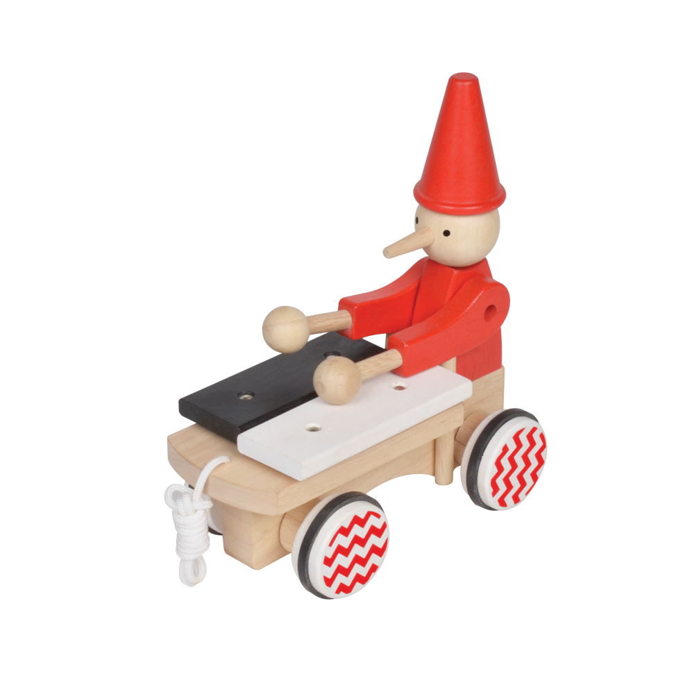 A wooden pull-along toy featuring a character resembling Pinocchio with a red hat, red jacket,  attached to a small wooden xylophone on wheels with a red and white zig-zag pattern.