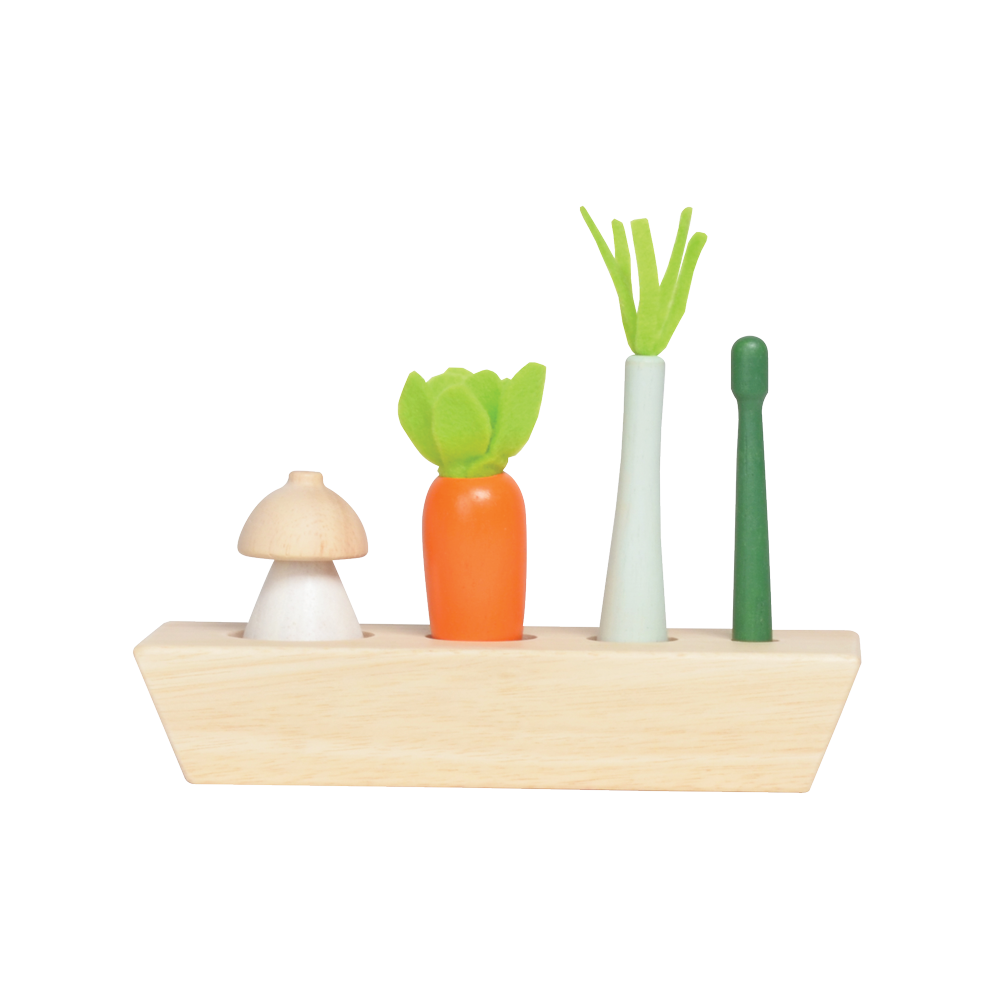 A wooden garden shop playset with various toy plants, pots, gardening tools, and a sign indicating a 'Garden Catalogue'.