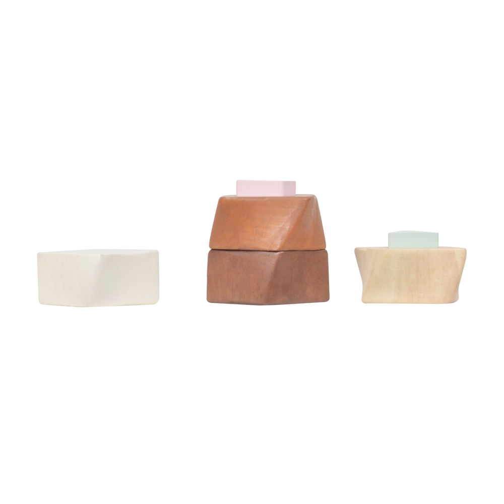 A twisted square column toy with geometric shapes in different colors.
