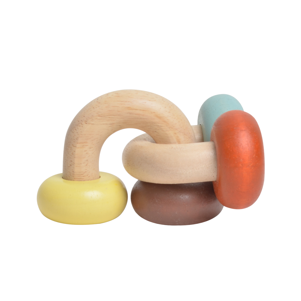 A colorful baby rattle with a wooden chain and plastic beads in shades of blue, red, and beige.