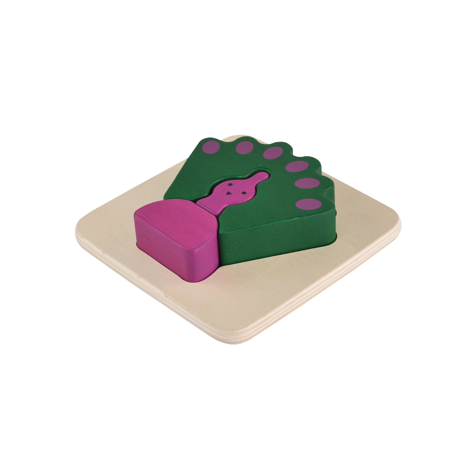 A wooden puzzle piece in the shape of a peacock with green and purple colors.
