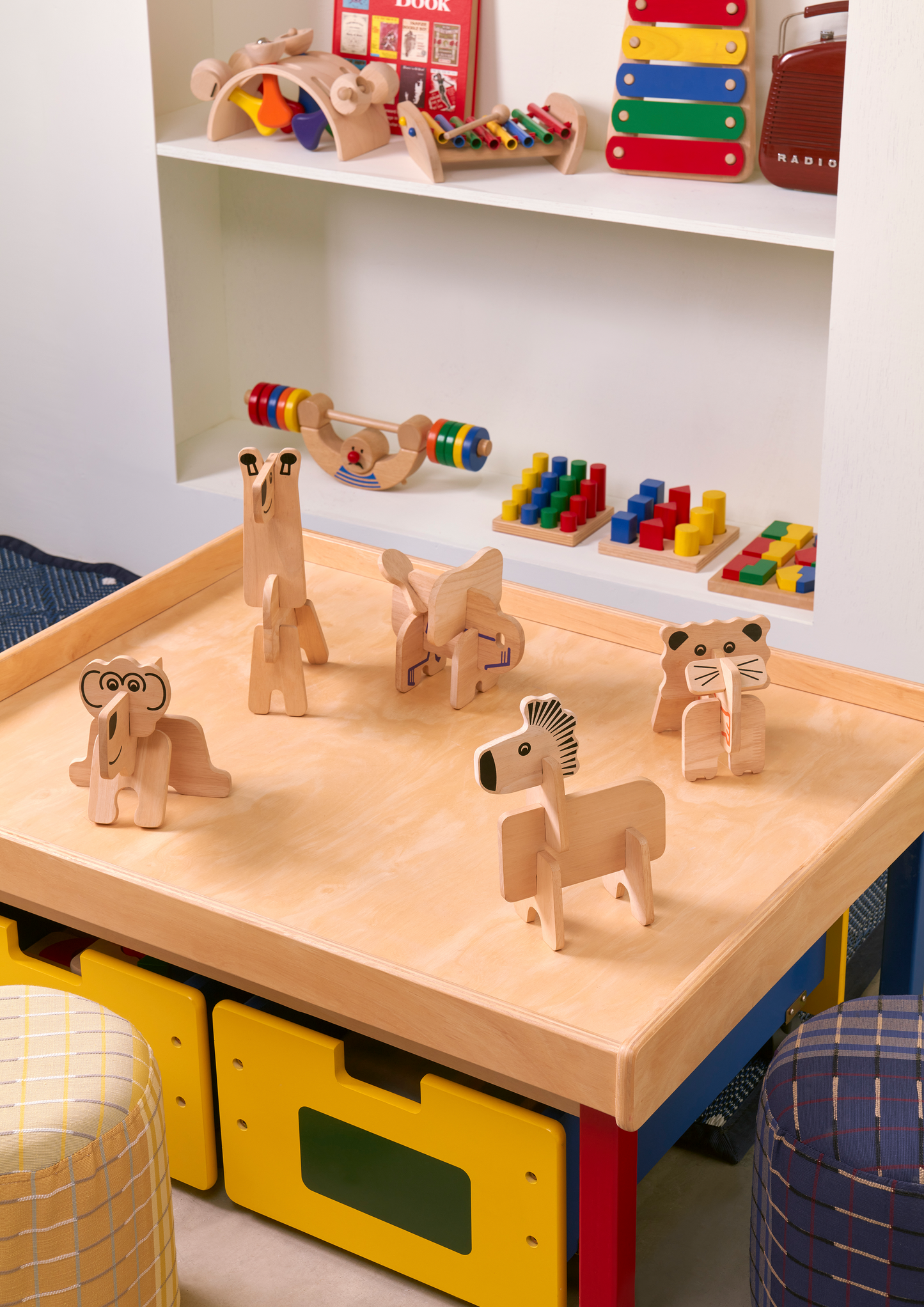 Durable stand holding 6 rhythm instruments: castanet, block drum, jingle bell, jingle stick, clapper, and maracas.