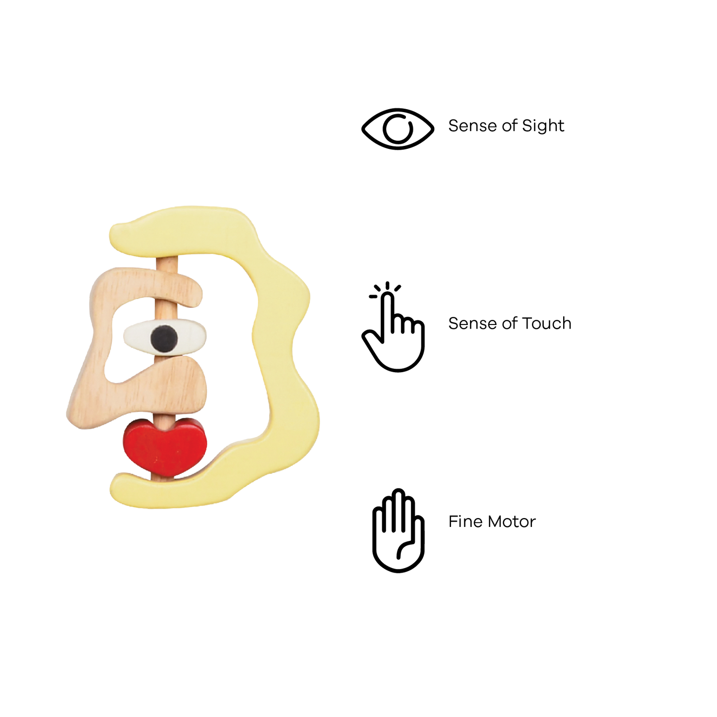 A wooden rattle in the shape of a stylized female face with a red heart detail.